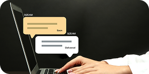 Two-way SMS and email conversation interface showing sent and delivered messages from a laptop.